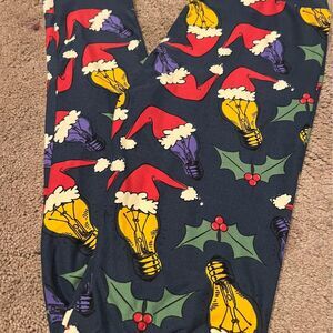 Woman’s LULAROE One Size christmas Santa Lightbulb Leggings OS